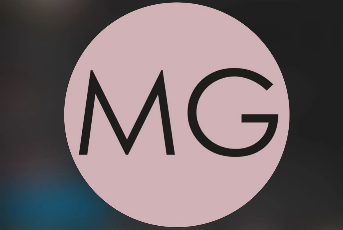MG